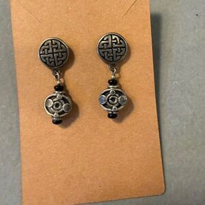 Sterling silver earrings with black geometric circular designs
